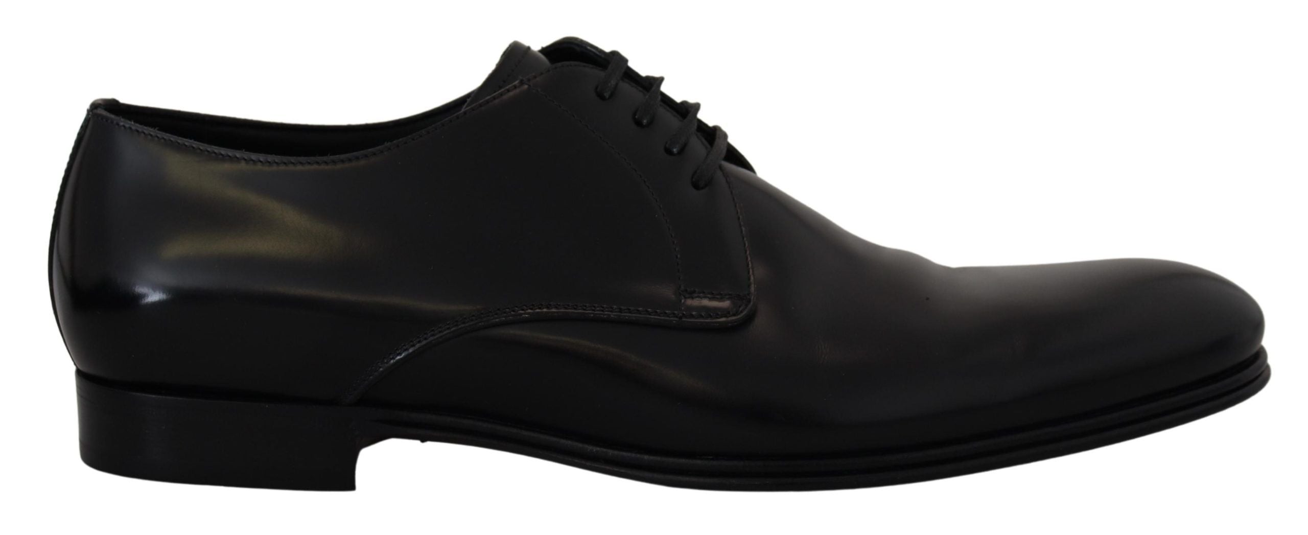 Black leather formal dress shoes by Dolce & Gabbana, polished and stylish with sleek design for elegant occasions.