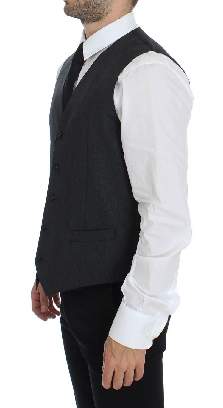 Gray wool formal dress vest by Dolce & Gabbana, tailored gilet with a sleek, sophisticated fit and classic design.