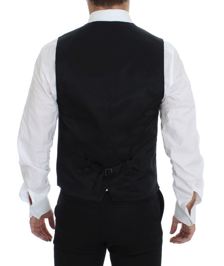 Gray wool formal dress vest by Dolce & Gabbana, tailored gilet with classic design and sleek fit, suitable for elegant occasions.