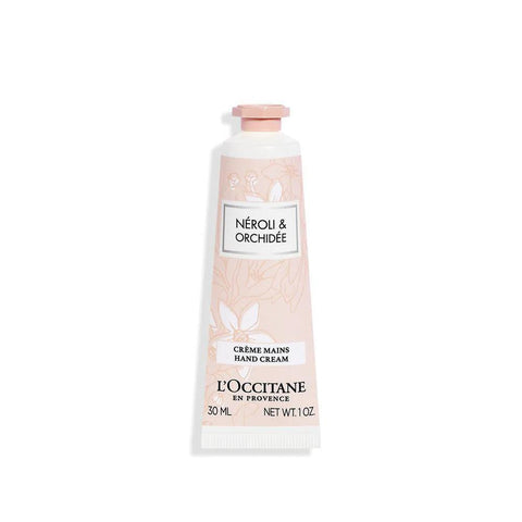 L'Occitane Neroli Hand Cream in 30ml tube, featuring bright orange and white packaging with a floral design.