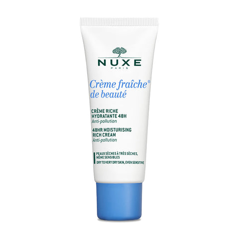 Jar of Nuxe Crème Fraîche de Beauté moisturizing cream for dry skin, 30ml, with a smooth, creamy texture and natural ingredients.