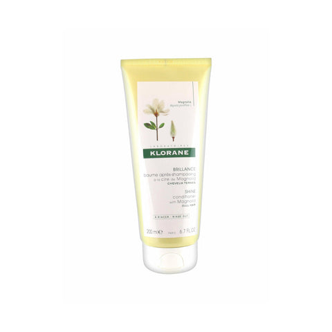 Klorane Magnolia Balm 150ml jar with floral label, displayed on a neutral background, showcasing the skincare product.