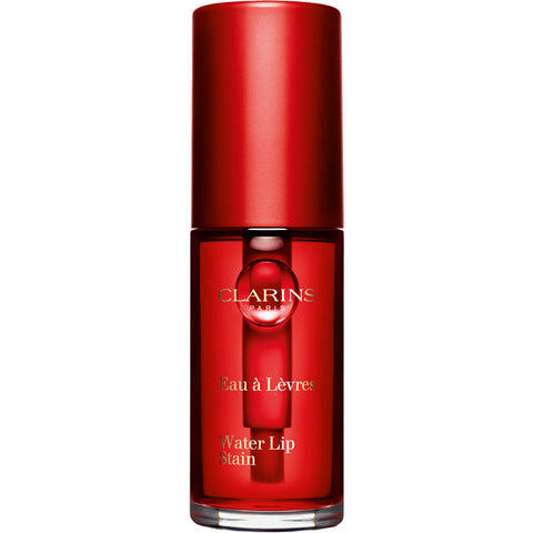 Jag Couture London New York Clarins Water Lip Stain 03 Red Water applied on lips, showcasing a vibrant red lip color with a glossy finish.