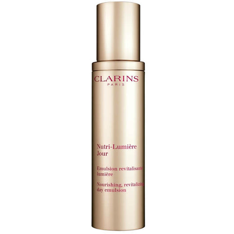 Clarins Nutri-Lumière Jour nourishing day emulsion in a 50ml jar, featuring a sleek white and silver container with product label.