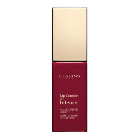 Jag Couture London New York Clarins Lip Comfort Oil Intense 08 Intense Burgundy applying rich, glossy lip oil on lips.
