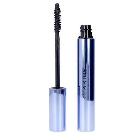 Jag Couture London New York Clarins Wonder Perfect 4D Waterproof Mascara in black, with a wand applying mascara on eyelashes.