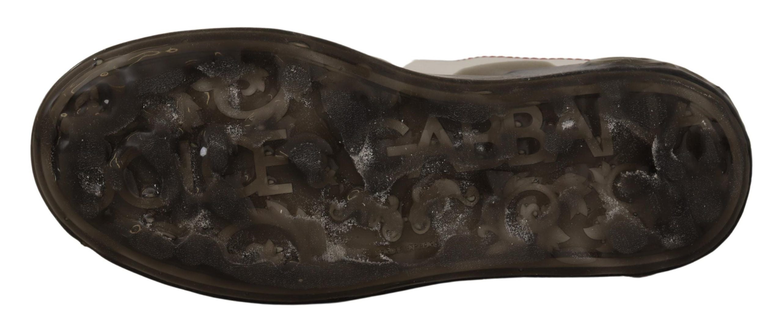 White leather women's Dolce & Gabbana Portofino sneakers with logo details, casual slip-on shoes for everyday wear.