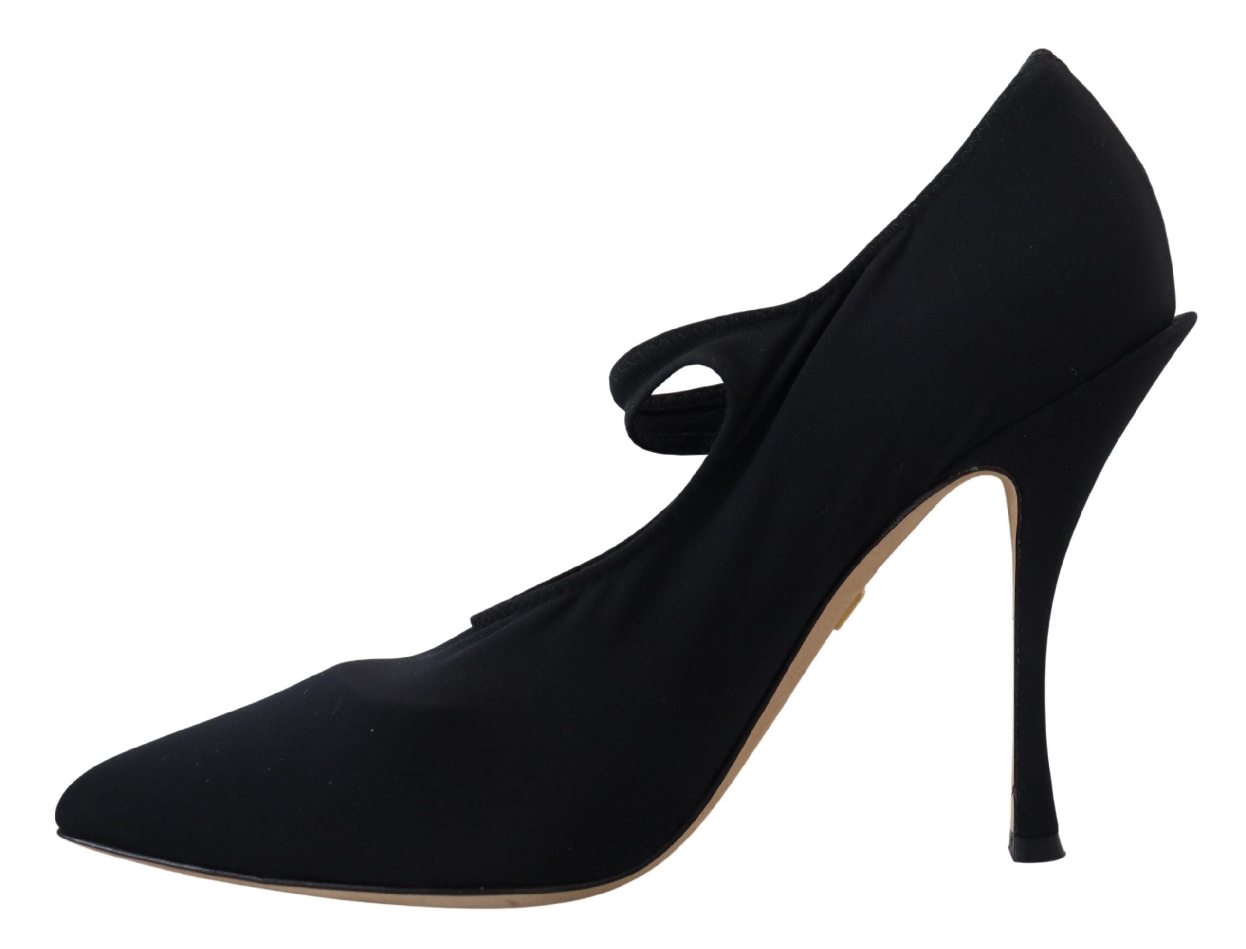 Black stretch crystal pumps with black socks, Dolce & Gabbana footwear, featuring elegant design and shiny crystal embellishments.