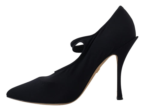 Black stretch crystal pumps with black socks, Dolce & Gabbana footwear, featuring elegant design and shiny crystal embellishments.
