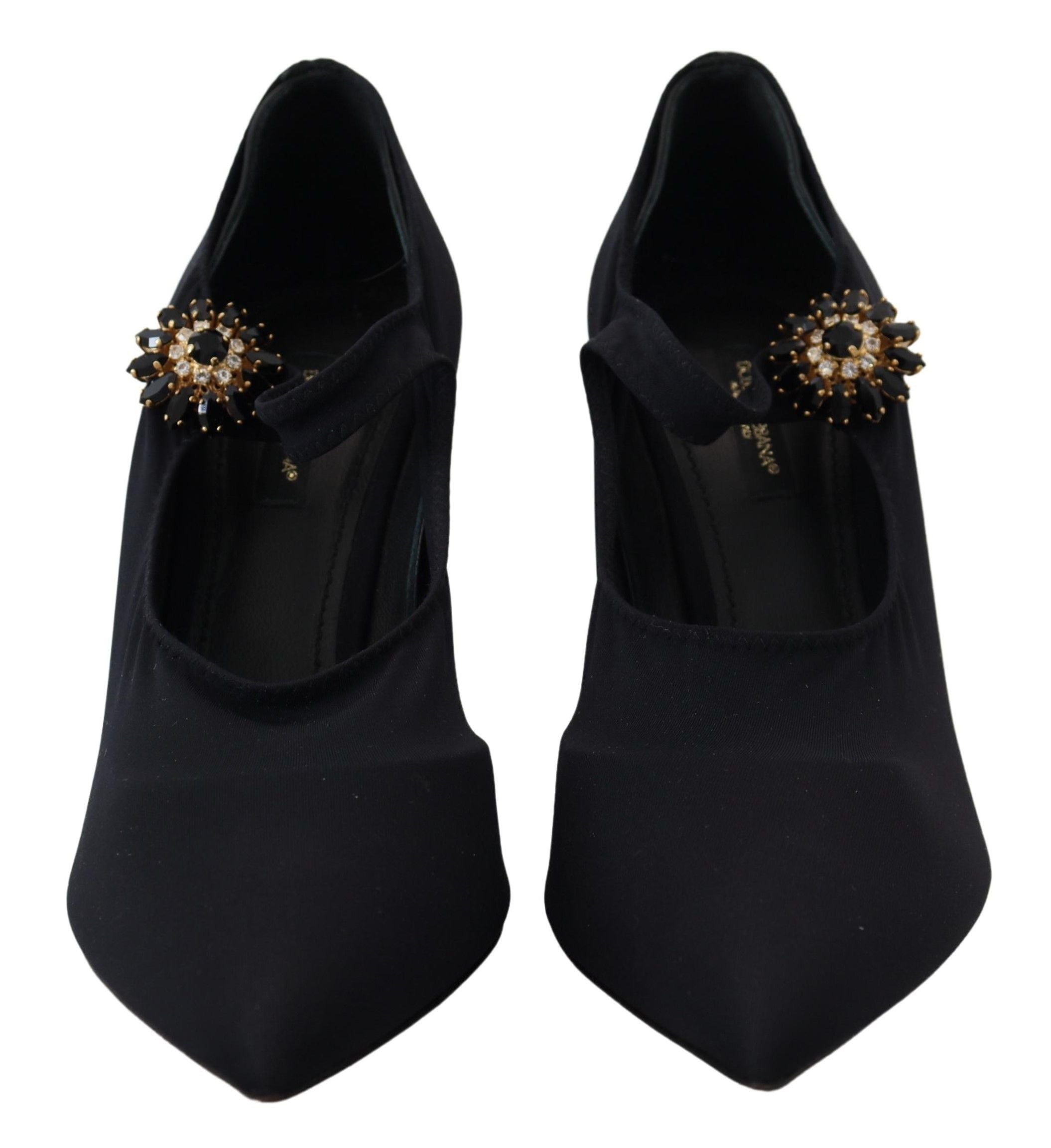 Black stretch crystal pumps shoes with black socks, stylish footwear by Dolce & Gabbana, displayed in the image.
