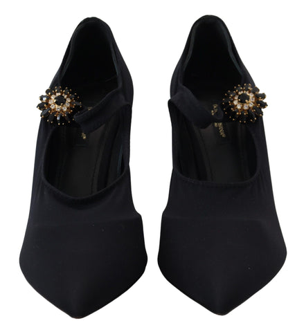 Black stretch crystal pumps shoes with black socks, stylish footwear by Dolce & Gabbana, displayed in the image.