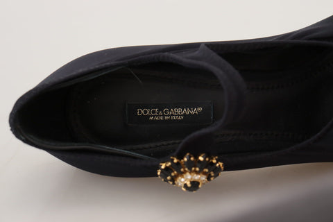 Black stretch crystal pumps featuring sleek design and elegant detailing, perfect for stylish occasions.