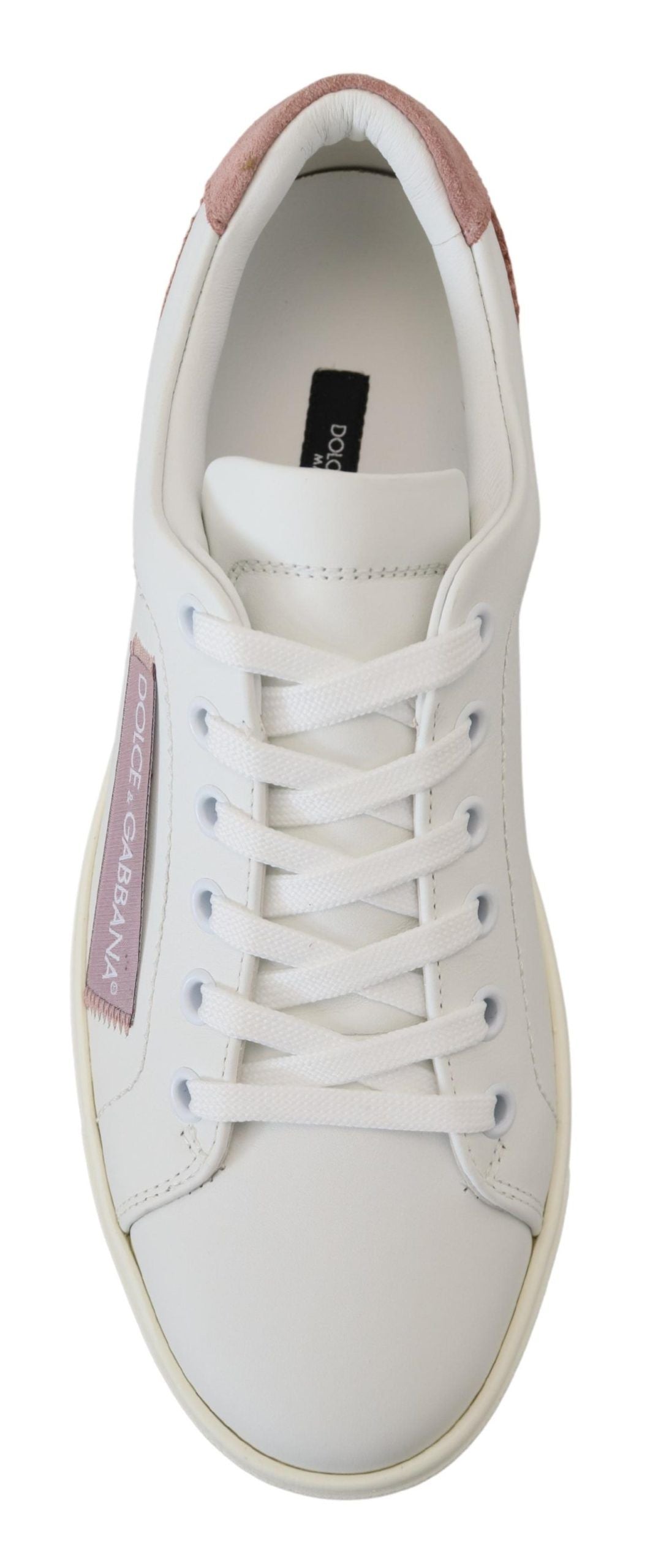 White and pink leather low top sneakers by Dolce & Gabbana, featuring stylish design and comfortable fit.