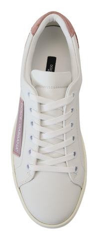 White and pink leather low top sneakers by Dolce & Gabbana, featuring stylish design and comfortable fit.