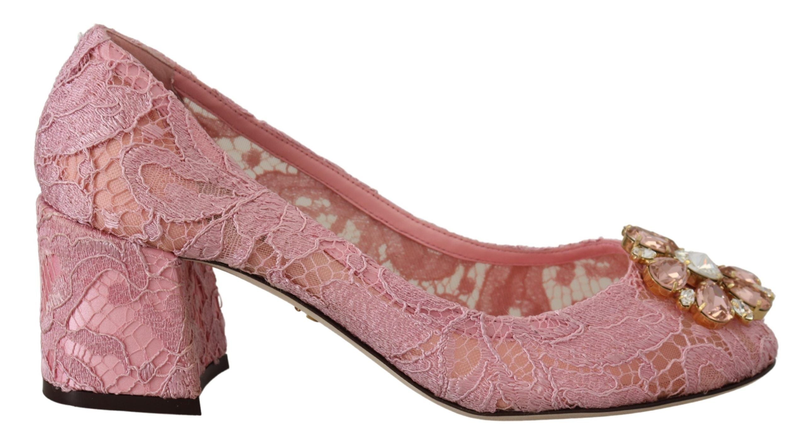 Pink Taormina lace crystal pumps by Dolce & Gabbana, featuring pastel-colored shoes with lace and crystal embellishments.
