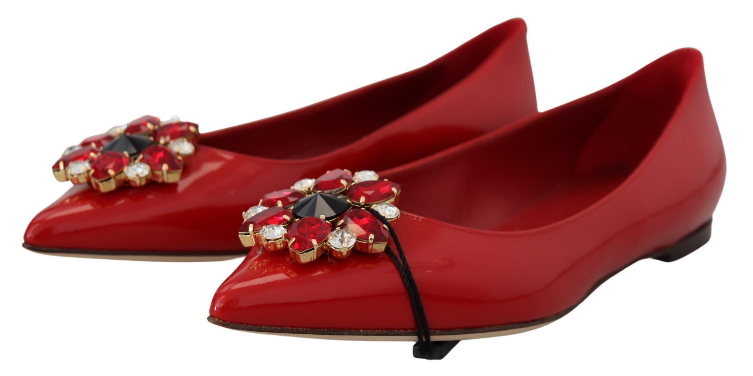 Red leather Dolce & Gabbana crystal-embellished loafers with slip-on flats and sleek design for stylish comfort.