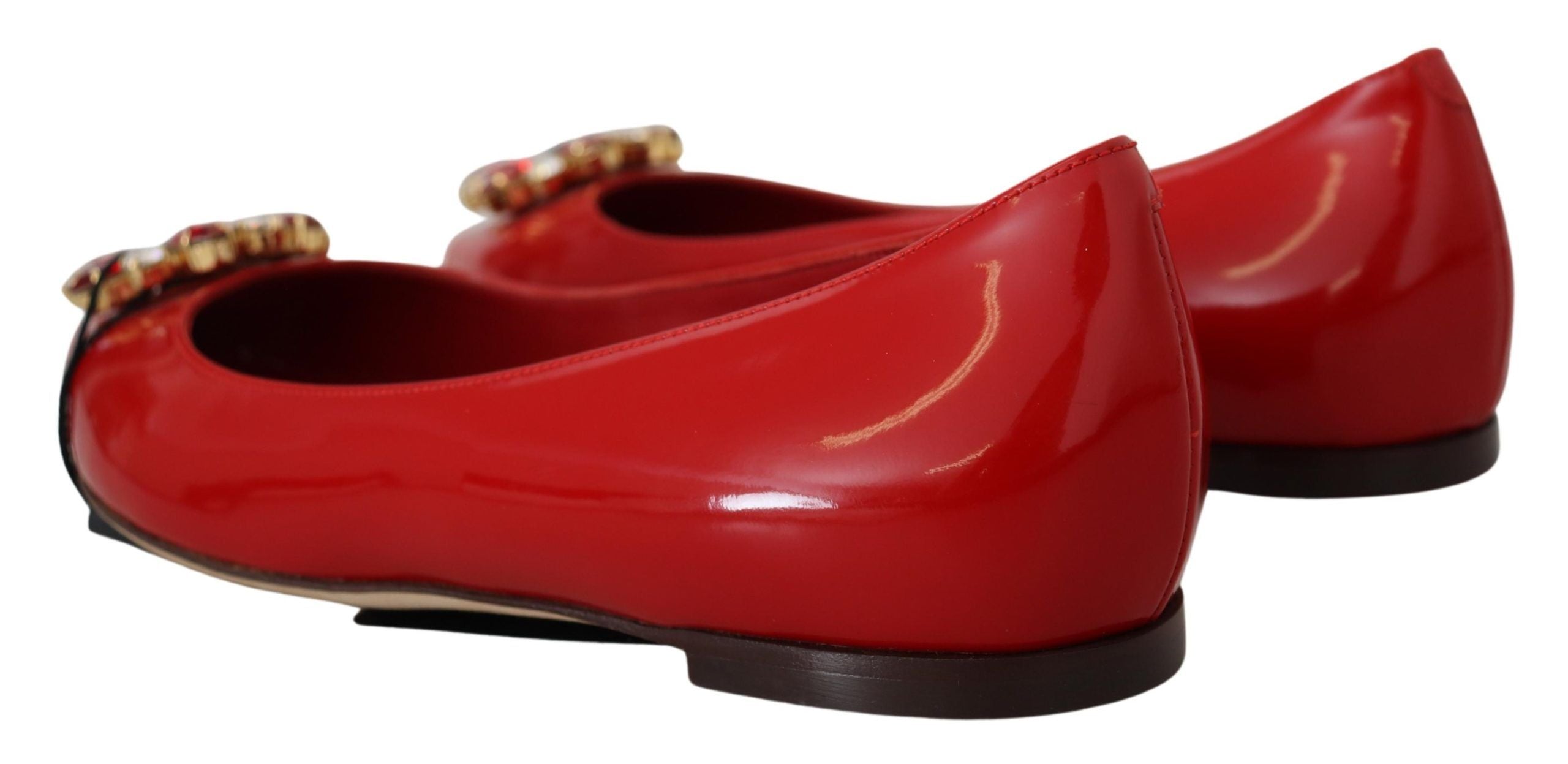 Red leather Dolce & Gabbana crystals loafers flats shoes with decorative embellishments and slip-on style.