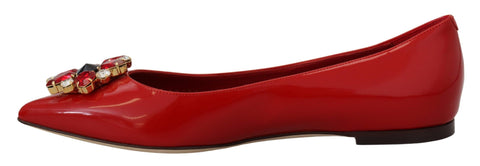 Dolce & Gabbana red leather loafers with crystal embellishments, flats shoes with slip-on design and stylish appearance.