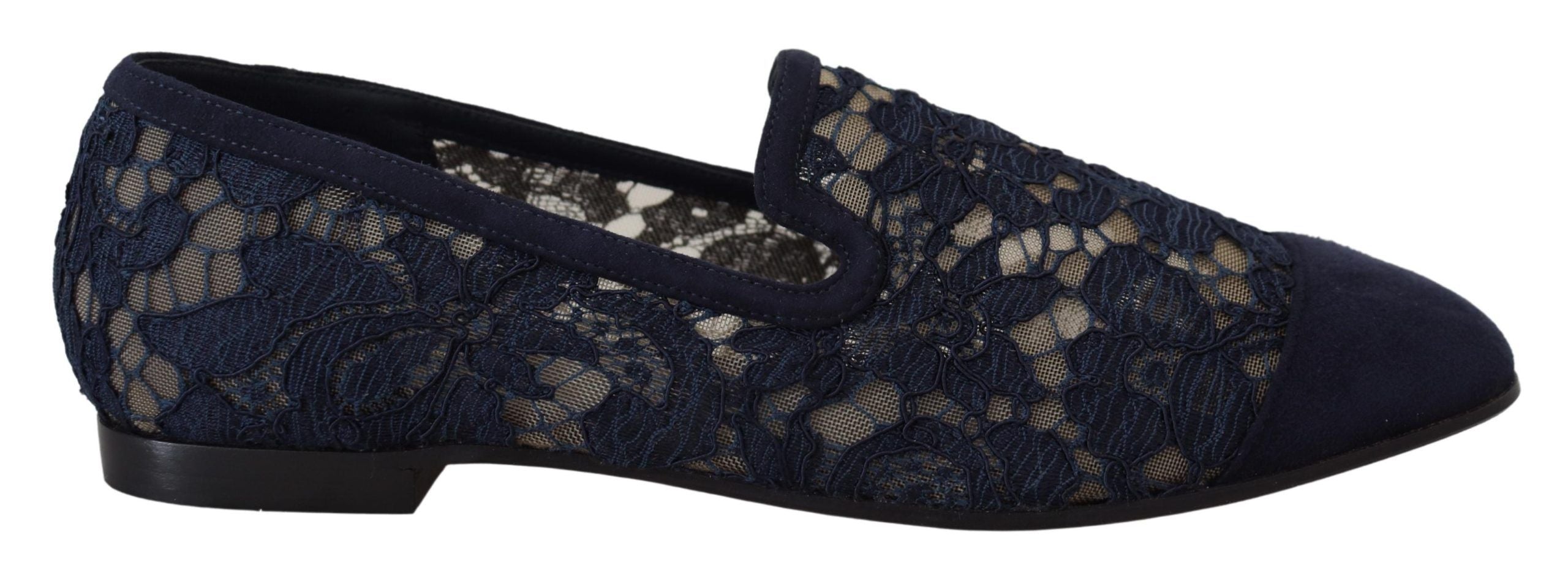 Blue floral lace slip-on loafers by Dolce & Gabbana featuring intricate lace detailing and comfortable flat shoe design.