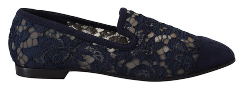Blue floral lace slip-on loafers by Dolce & Gabbana featuring intricate lace detailing and comfortable flat shoe design.