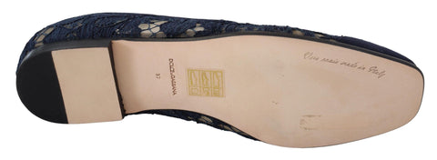 Blue floral lace slip-on loafers by Dolce & Gabbana featuring elegant floral lace design and flat shoe silhouette.