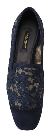 Blue floral lace slip-on loafers from Dolce & Gabbana featuring intricate lace detail and comfortable flat shoe design.