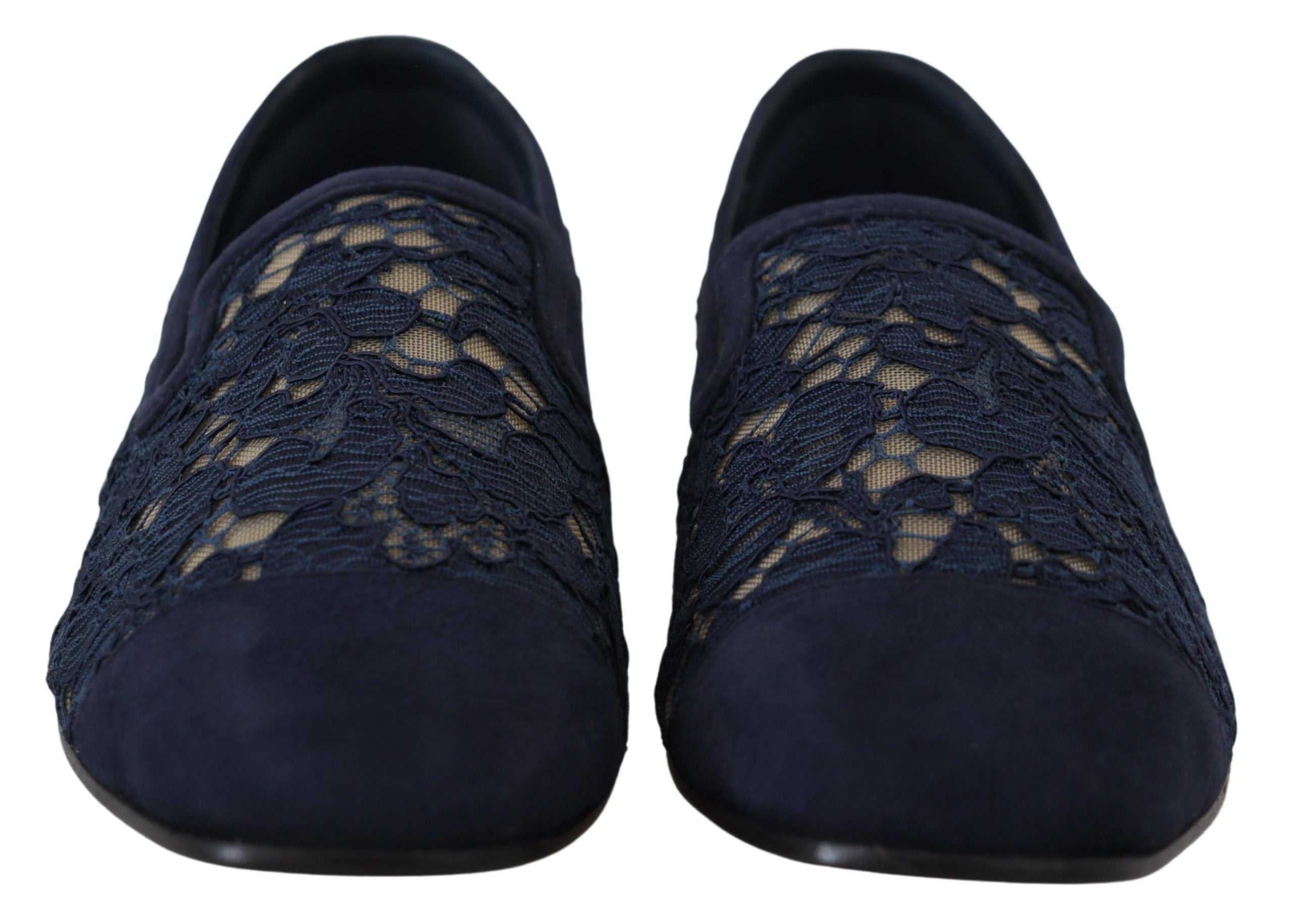 Blue floral lace slip-on loafers from Dolce & Gabbana with intricate lace detailing and a sleek flat shoe design.
