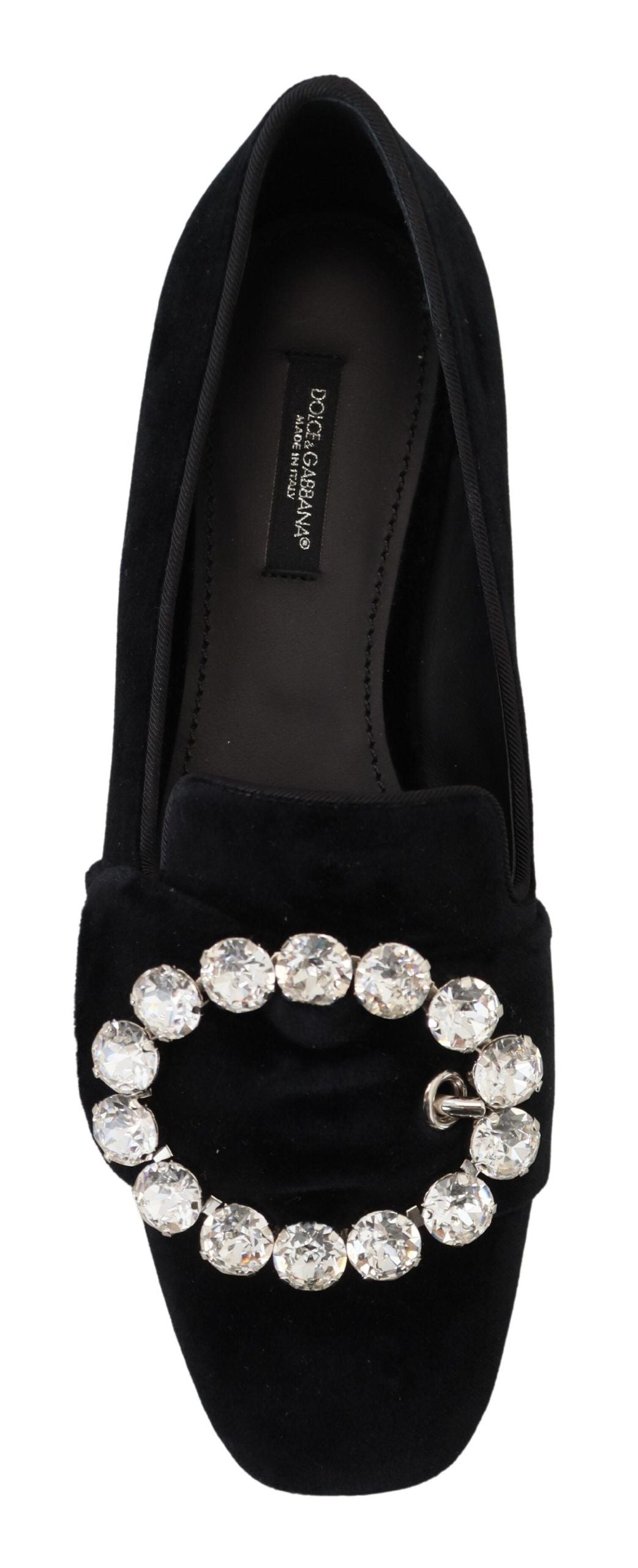Black velvet loafers with crystal embellishments from Dolce & Gabbana, featuring a sleek flat shoe design.