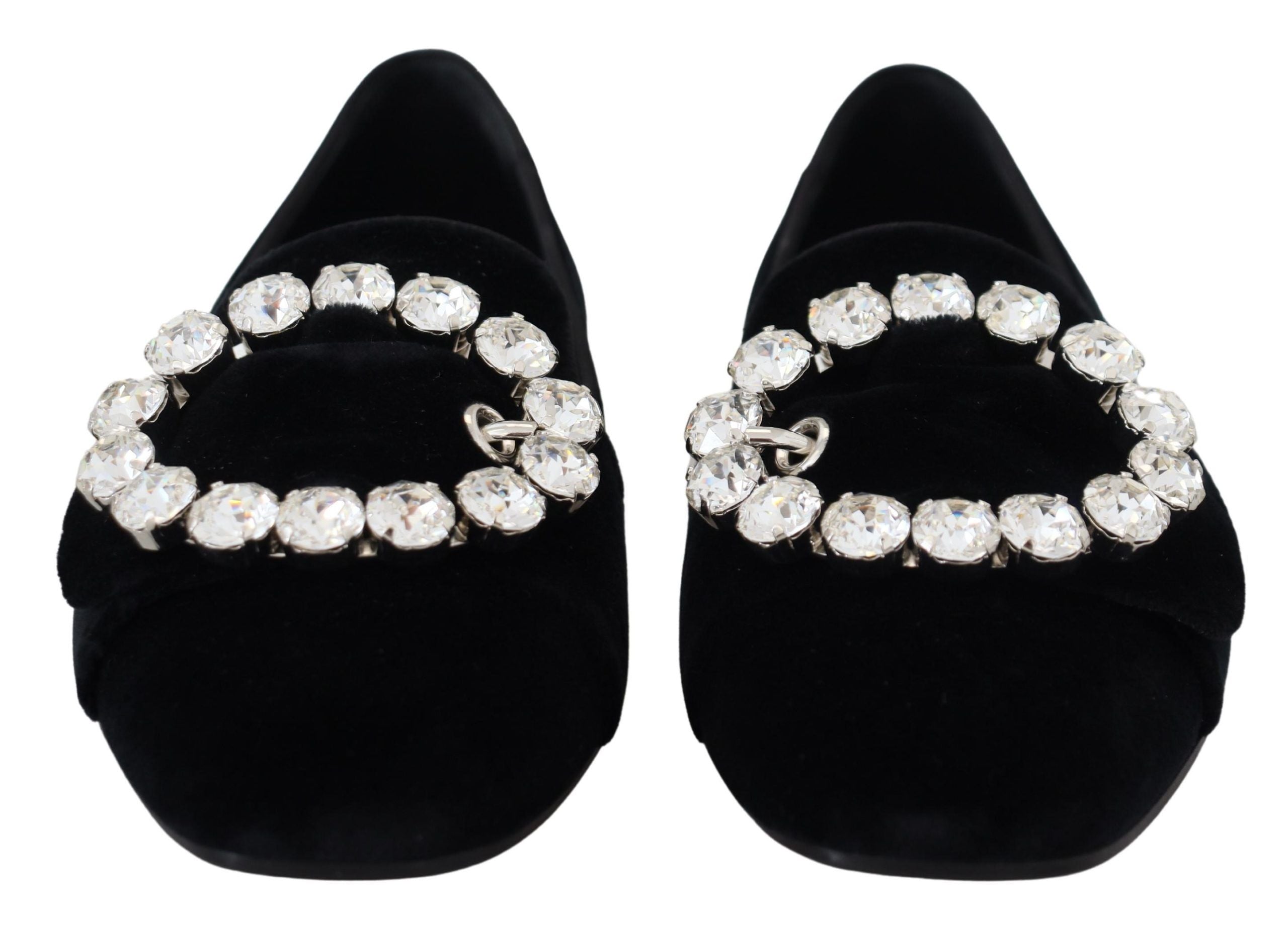 Black velvet loafers with crystal embellishments from Dolce & Gabbana, featuring a sleek slip-on design and elegant detailing.