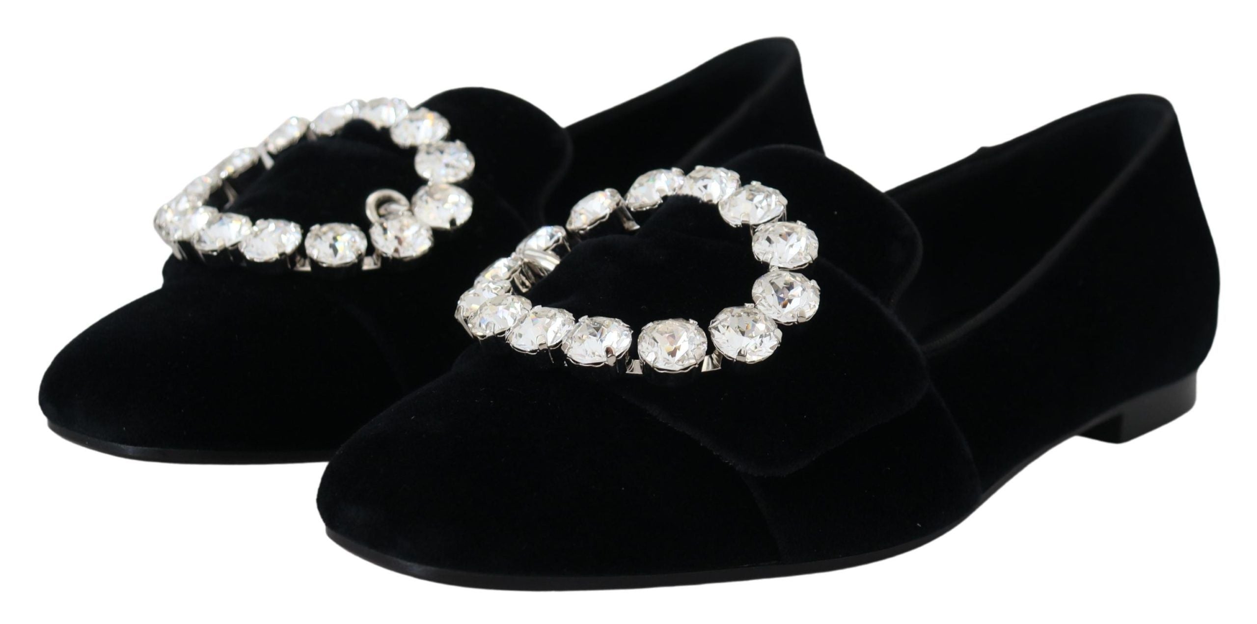 Black velvet loafers with crystal embellishments from Dolce & Gabbana, stylish flats shoes featuring a sleek design.