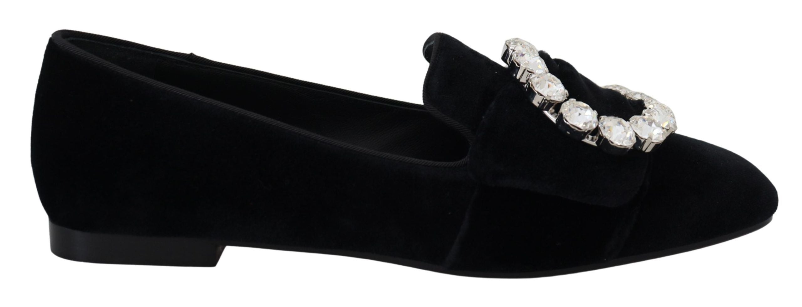 Black velvet loafers with crystal embellishments by Dolce & Gabbana, featuring a slip-on design and elegant flat sole.