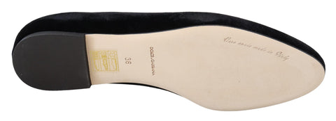 Black velvet slip-on loafers by Dolce & Gabbana, stylish flats shoes with sleek design and comfortable fit.
