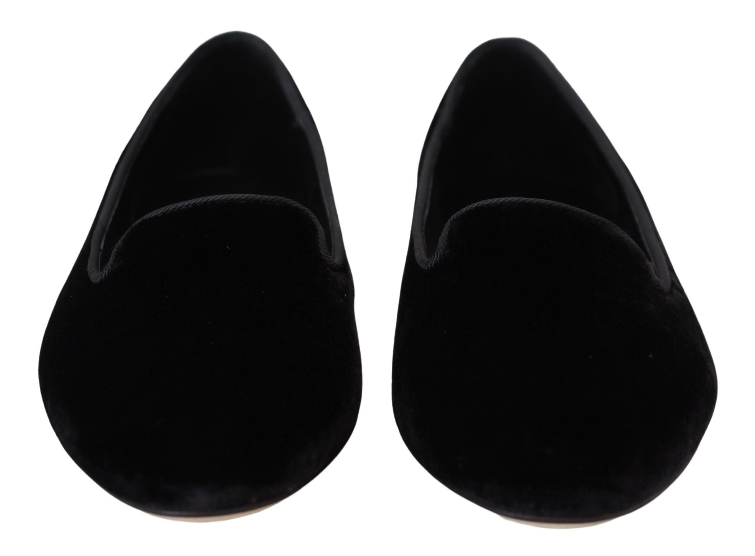Black velvet slip-on loafers by Dolce & Gabbana, stylish flats shoes with a sleek, smooth finish and classic design.