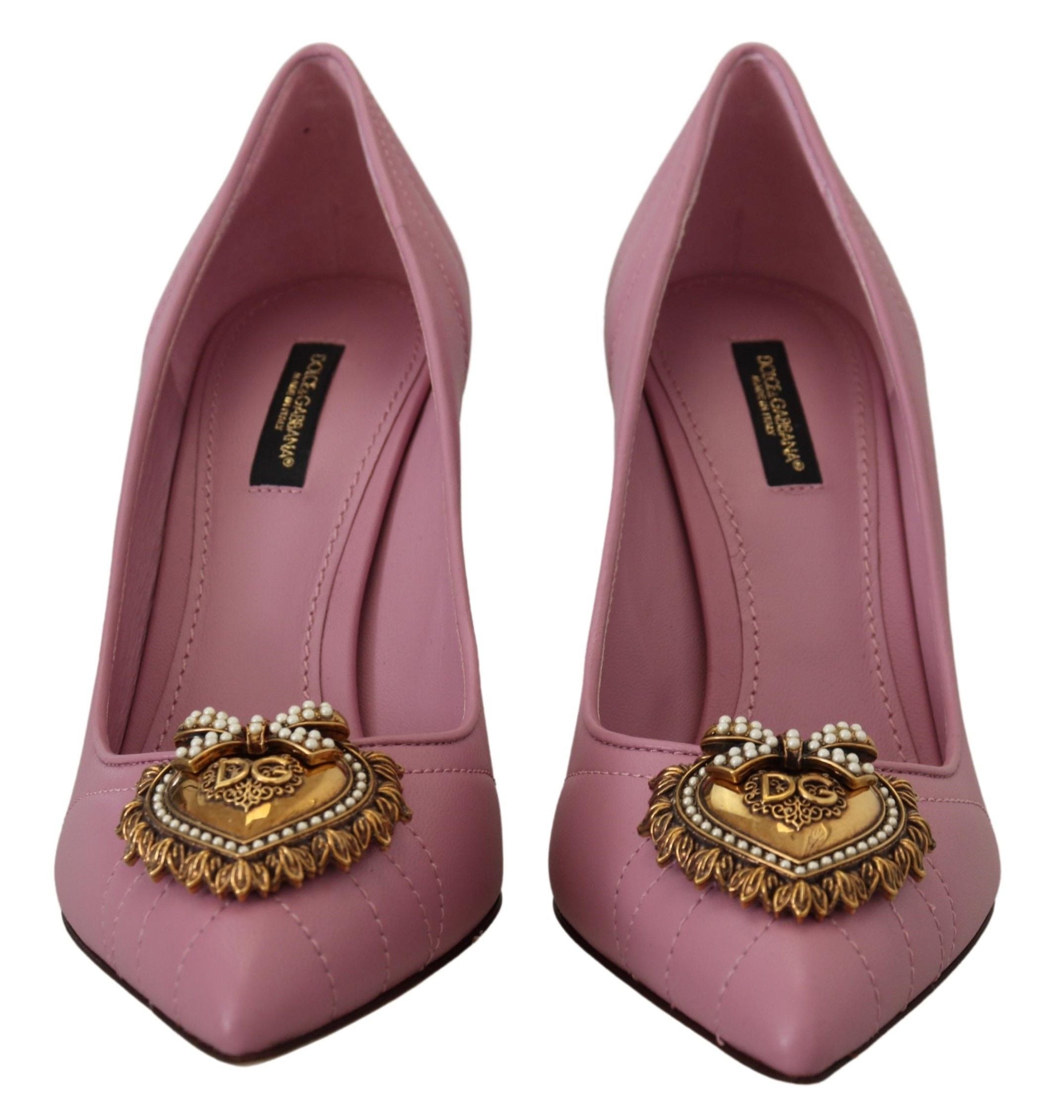 Pink leather heart-embellished heels by Dolce & Gabbana, featuring elegant pump design with a stylish heart detail.