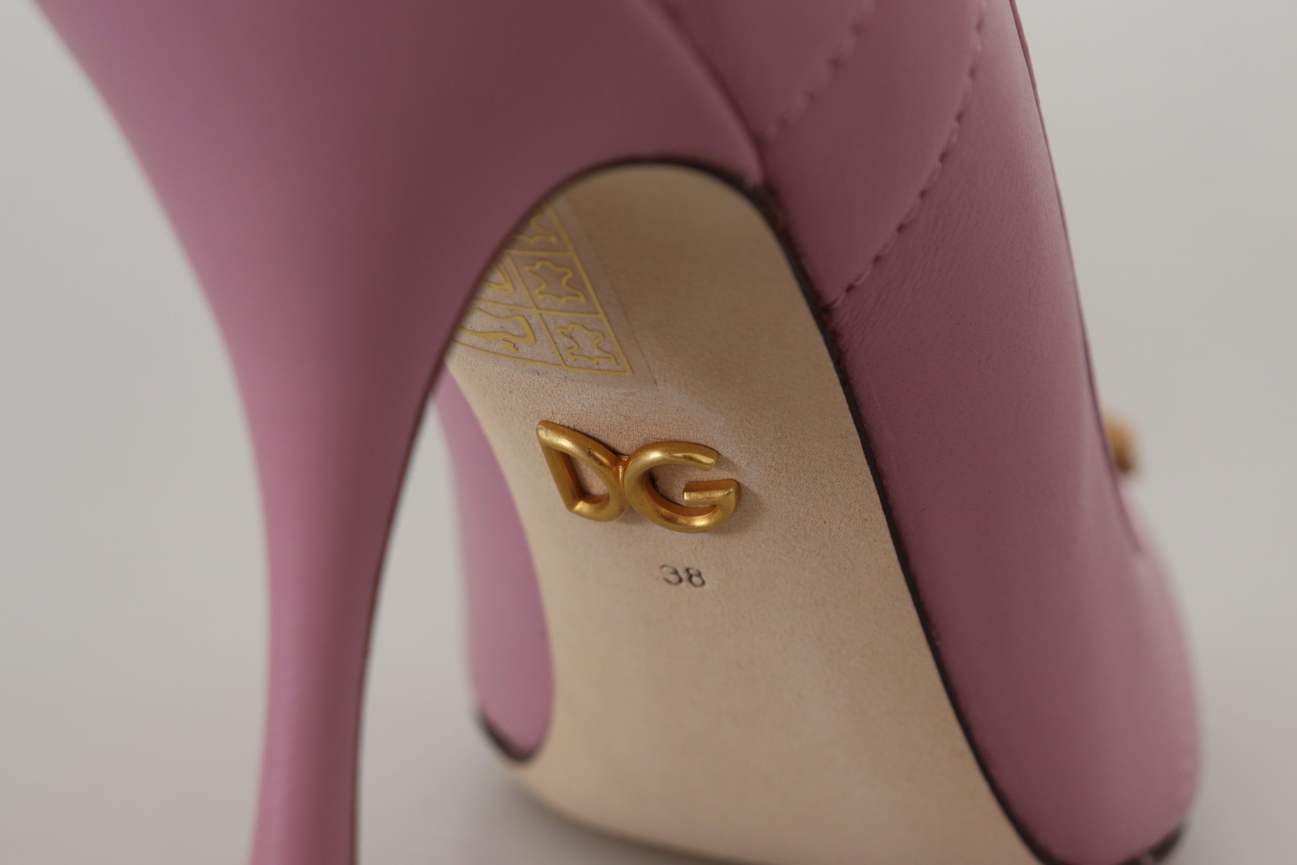 Pink leather heart-shaped DEVOTION heels by Dolce & Gabbana, featuring elegant pump shoes with stylish design details.