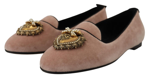 Pink velvet slip-on loafers by Dolce & Gabbana showcasing a sleek, flat design with a soft, luxurious appearance.