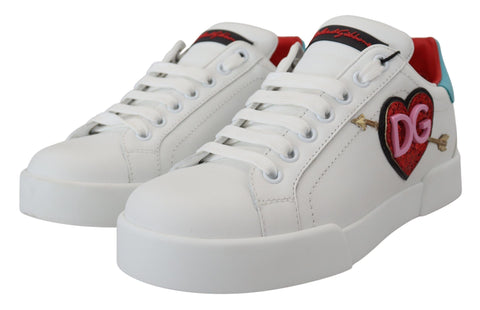 White leather sneaker with Dolce & Gabbana Portofino logo and heart detail, stylish casual shoe with sleek design.