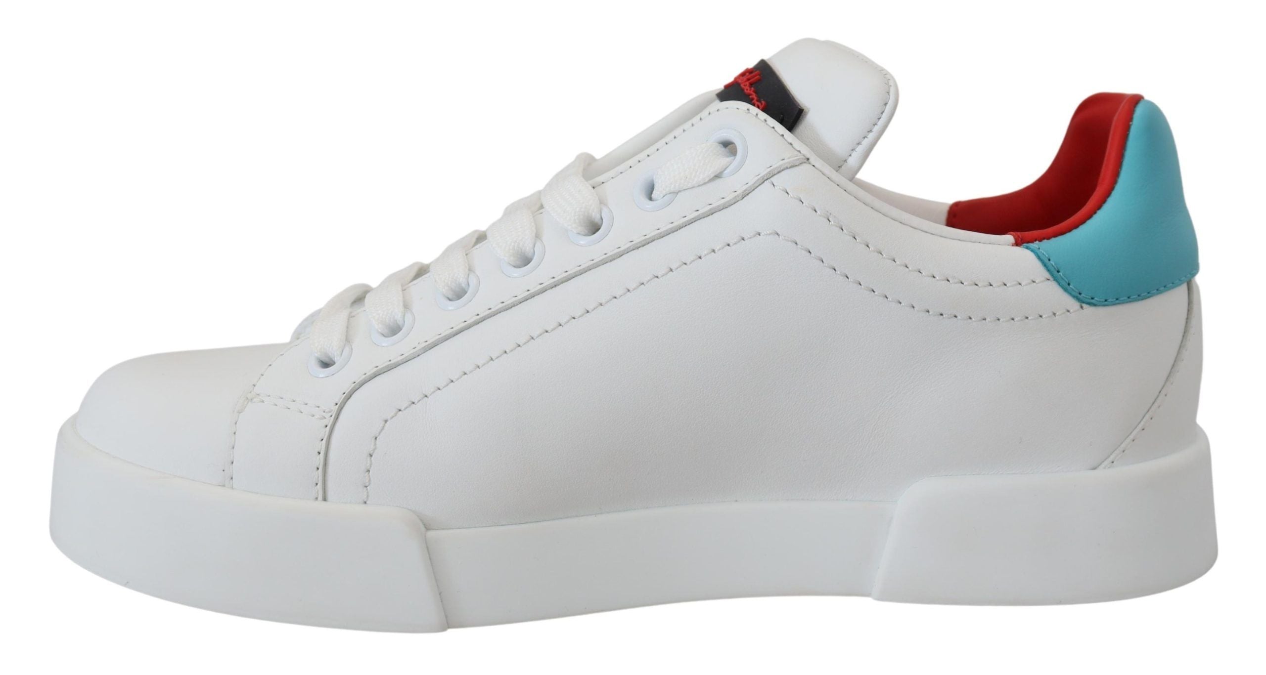 White leather sneaker by Dolce & Gabbana featuring Portofino logo and heart design, with a sleek, modern style.