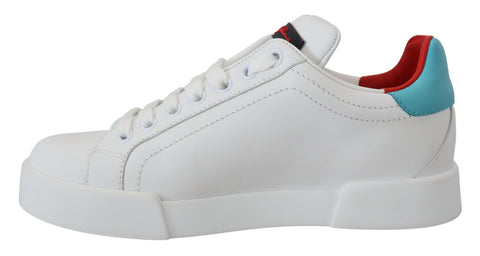 White leather sneaker by Dolce & Gabbana featuring Portofino logo and heart design, with a sleek, modern style.