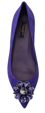 Purple suede loafers with crystal embellishments from Dolce & Gabbana, featuring a sleek flat shoe design.
