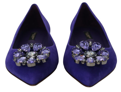 Purple suede loafers with crystal embellishments from Dolce & Gabbana, featuring a sleek flat shoe design and stylish details.