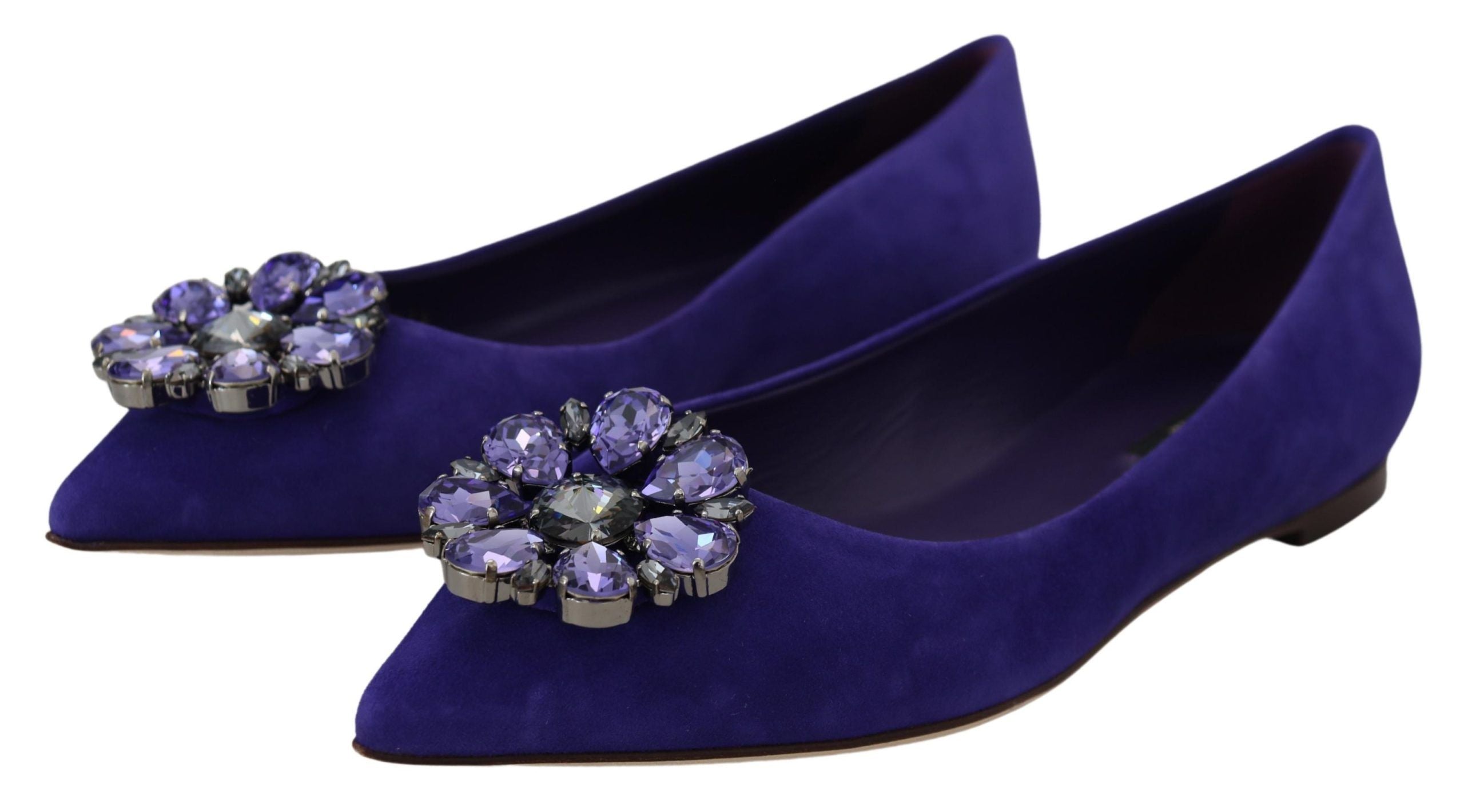 Purple suede loafers with crystal embellishments from Dolce & Gabbana, featuring a sleek flat shoe design.