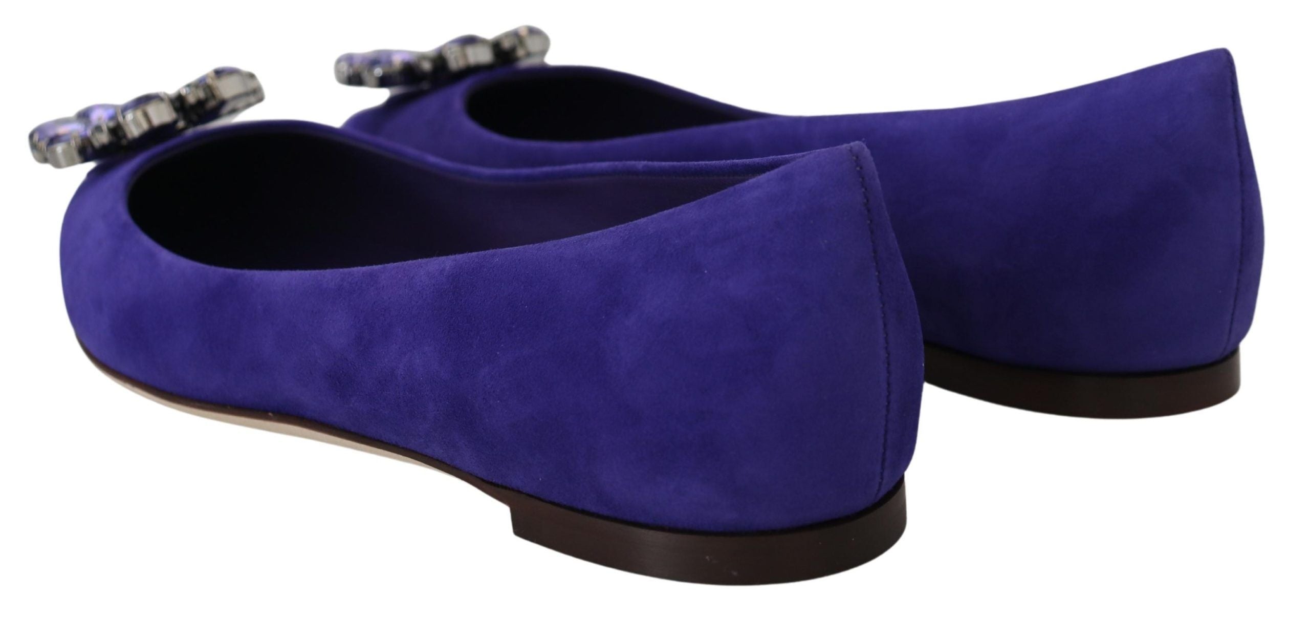 Purple suede loafers with crystal embellishments from Dolce & Gabbana, featuring a flat shoe design and stylish slip-on style.