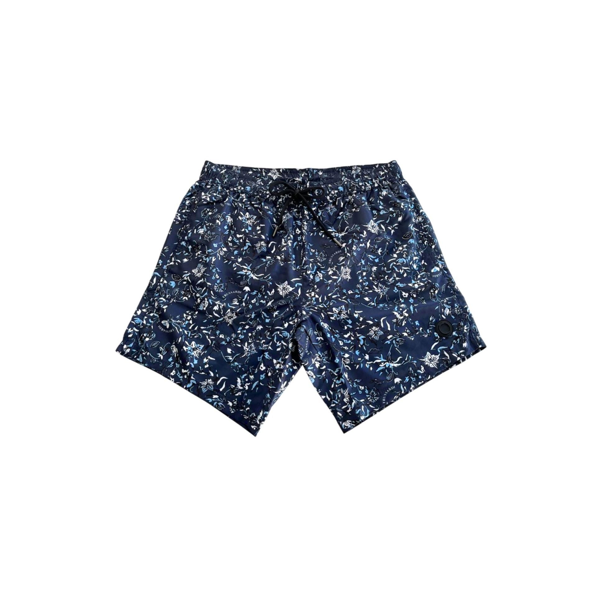 Navy Trussardi beachwear TRU25MBM09 with stylish design, displayed on a model in a beach setting, showcasing the luxury brand's style.