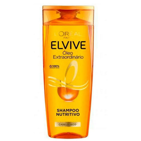 L'oreal Professionnel Elvive Extraordinary Oil Shampoo in a 690ml bottle, with sleek packaging and gold accents.