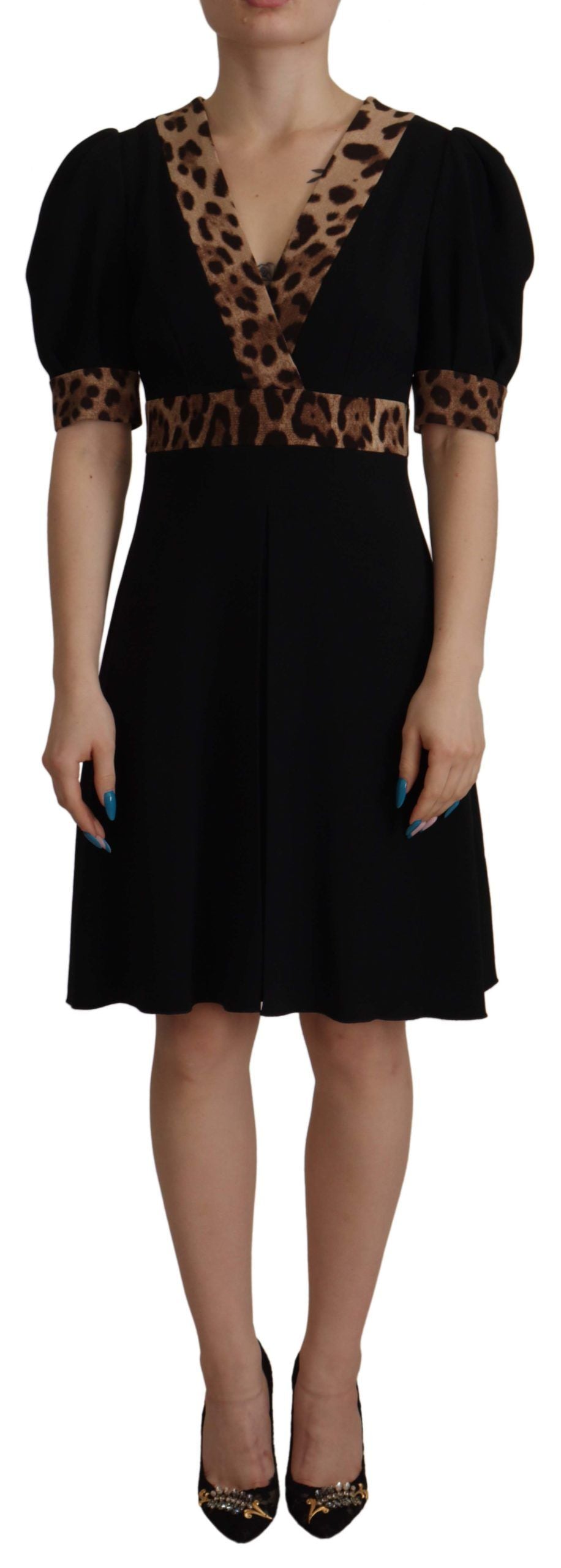 Black leopard print Dolce & Gabbana A-line knee-length dress with long sleeves and fitted waist.