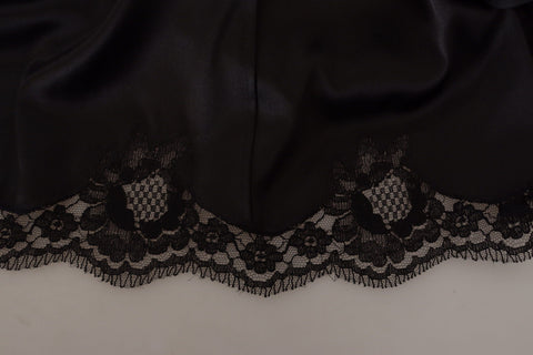 Black Leopard A-line knee-length dress by Dolce & Gabbana, featuring bold leopard print and elegant silhouette.