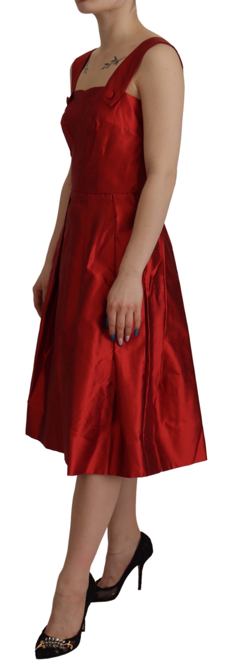 Red Dolce & Gabbana A-line pleated satin silk dress with a fitted bodice and flowing skirt, showcased from a front view.