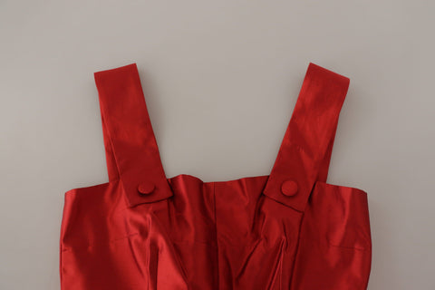 Red A-line pleated satin silk dress by Dolce & Gabbana, featuring a flowing silhouette and elegant design.