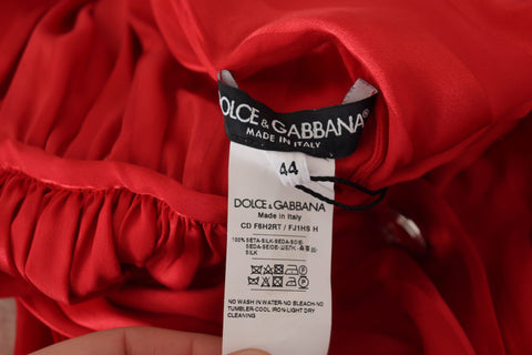 Red satin midi dress with button-down front and belted waist by Dolce & Gabbana, featuring a luxurious silk finish.